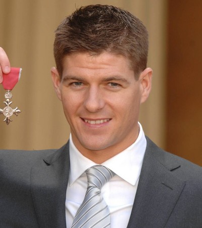 Steven Gerrard Recieves an MBE Medal at Buckingham Palace From The Queen of England