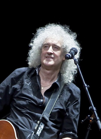 Brian May from Queen performs with Kerry Elils during "Acoustic